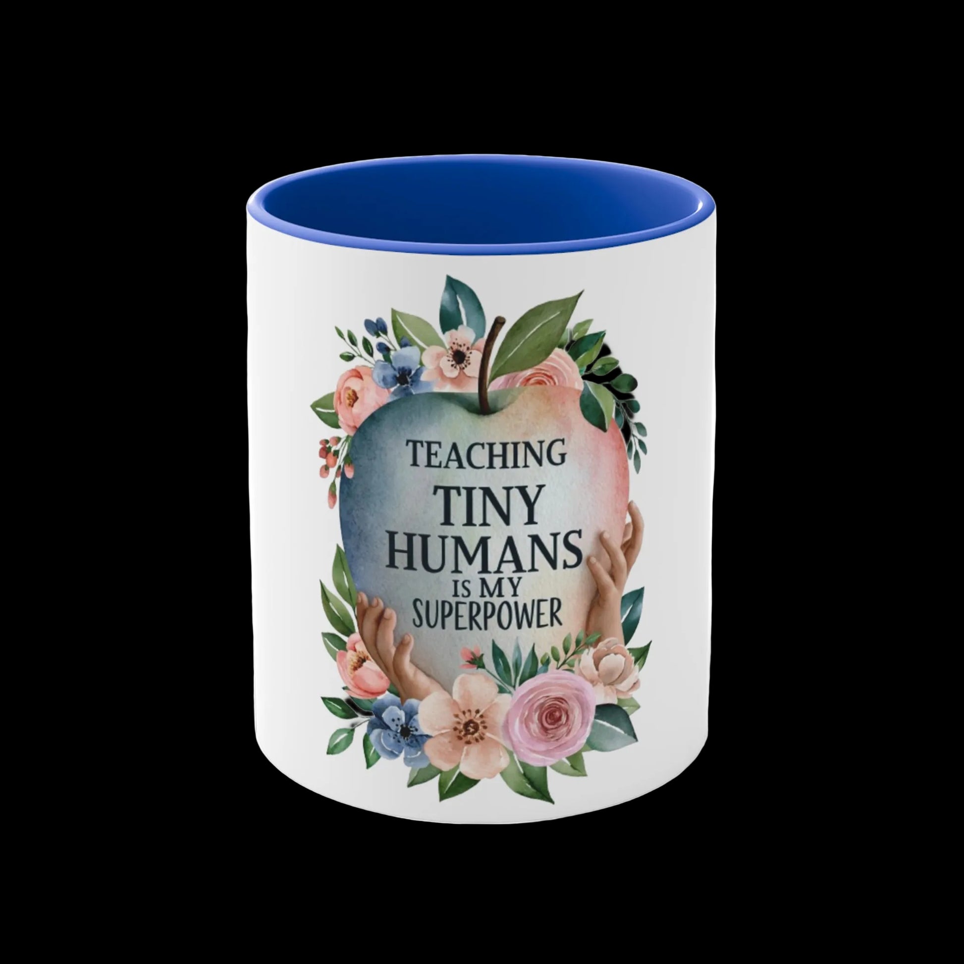 Mug with floral design and text 'Teaching Tiny Humans is my Superpower' on a white background